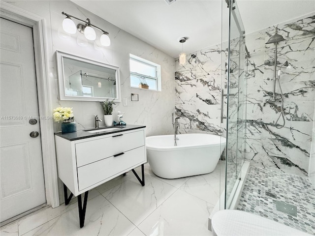 bathroom with tile walls, vanity, and separate shower and tub