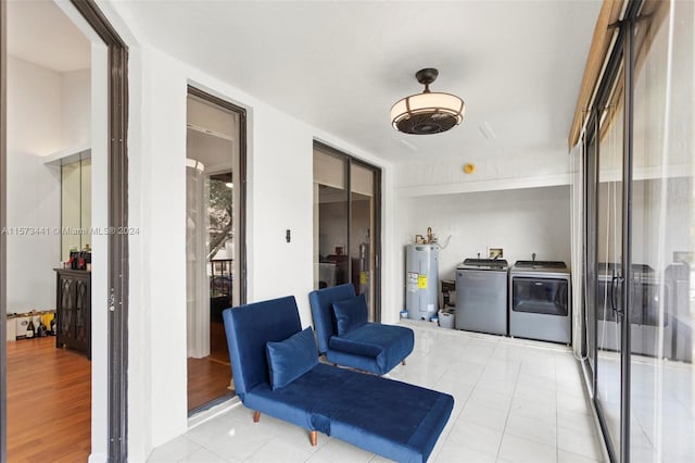 view of patio / terrace featuring water heater and washing machine and dryer