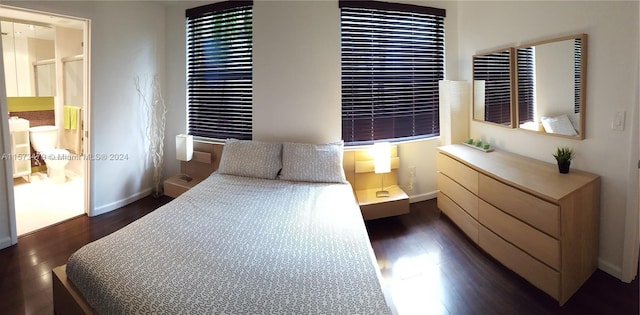 bedroom featuring dark hardwood / wood-style floors