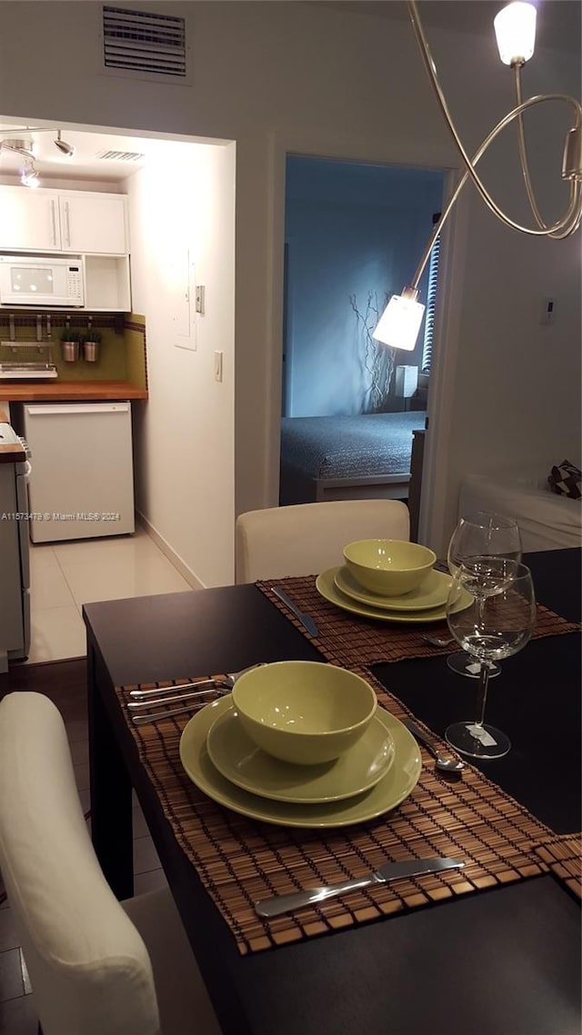 view of tiled dining space