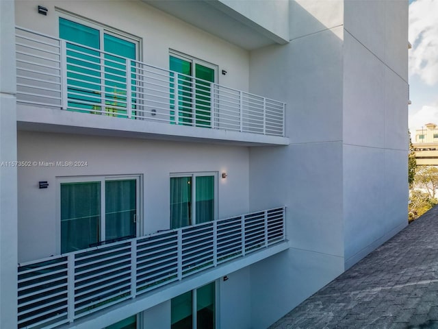 view of property exterior featuring a balcony