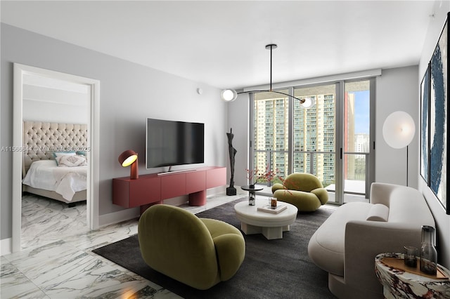 living room with floor to ceiling windows