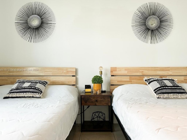 bedroom featuring tile flooring