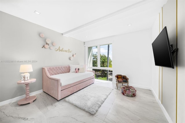 living room with beam ceiling