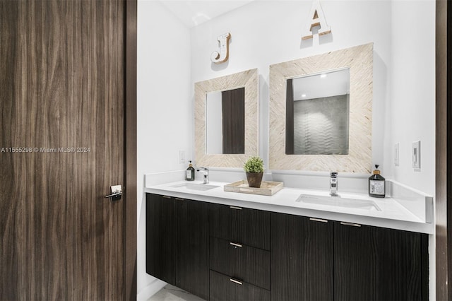 bathroom featuring double sink and oversized vanity