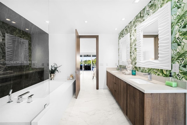 bathroom featuring a bathing tub, double sink, tile floors, and oversized vanity