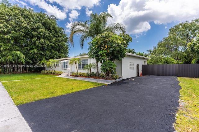 view of front of home with a front yard