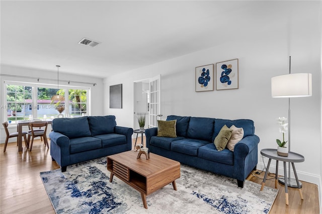 living room with hardwood / wood-style floors