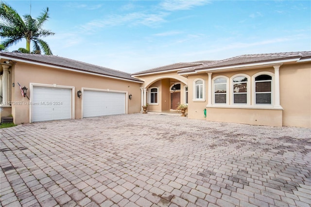 view of front of home featuring a garage