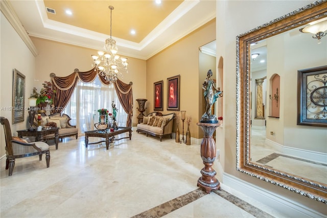 interior space with a raised ceiling, tile floors, and ornamental molding