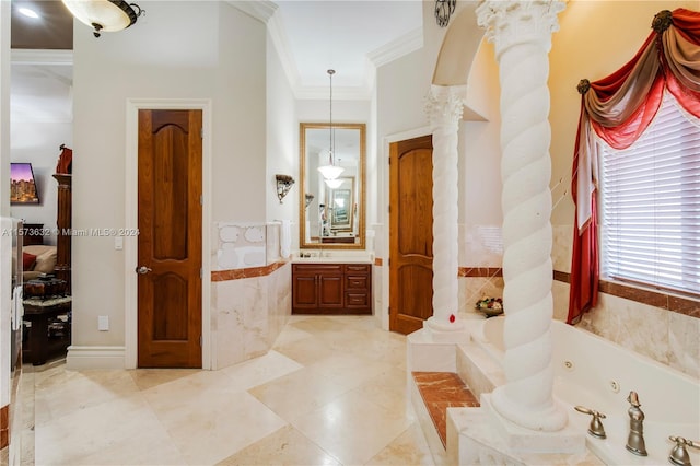 bathroom featuring a relaxing tiled bath, ornate columns, vanity, and tile floors