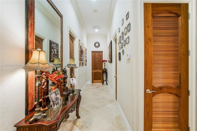 corridor featuring crown molding and tile flooring