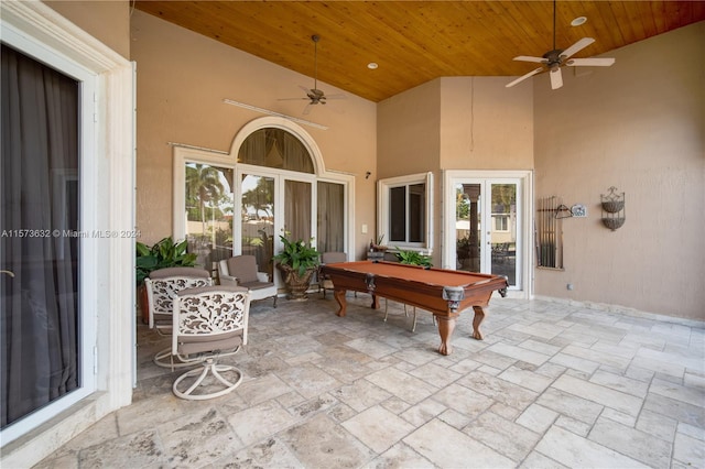 view of patio featuring french doors and ceiling fan