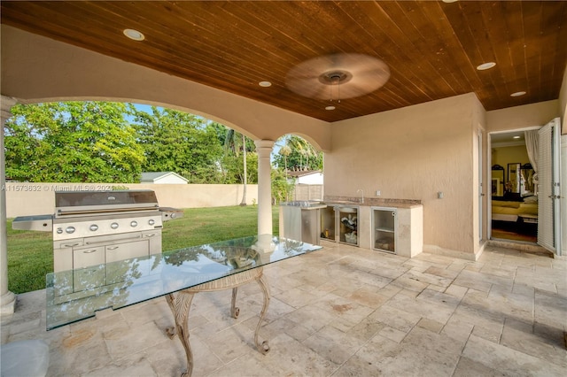 view of patio with exterior kitchen