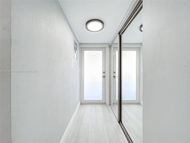 hall featuring hardwood / wood-style flooring