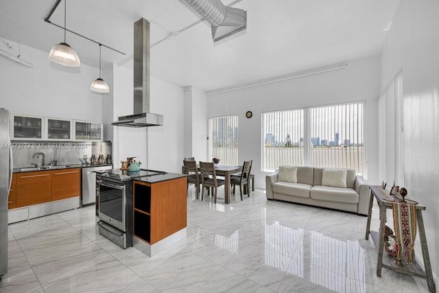 kitchen with stainless steel electric range, light tile flooring, tasteful backsplash, a high ceiling, and extractor fan