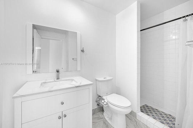 bathroom with curtained shower, oversized vanity, toilet, and tile flooring