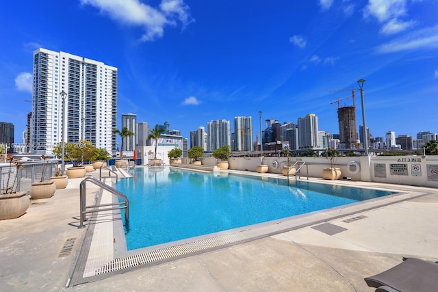 view of pool featuring a patio