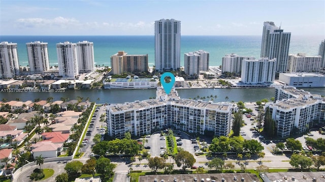 birds eye view of property featuring a water view