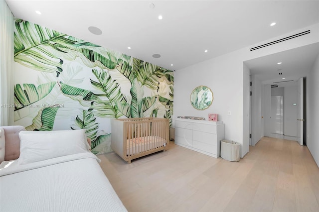 bedroom featuring light hardwood / wood-style floors