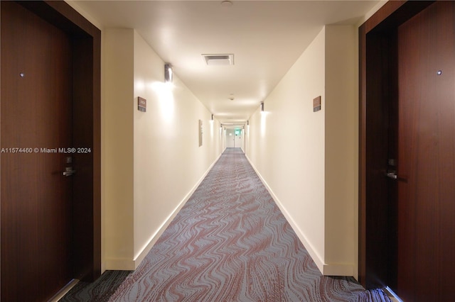 hall with carpet floors