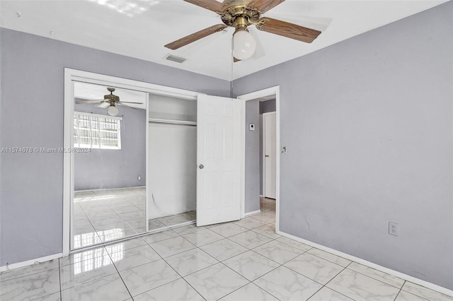 bathroom featuring tile patterned floors, vanity, and toilet