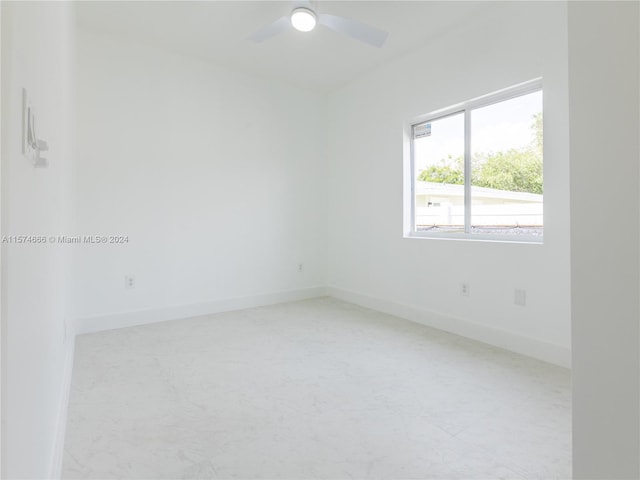 spare room featuring ceiling fan