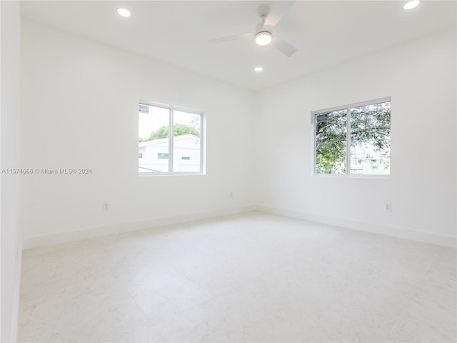 empty room featuring ceiling fan