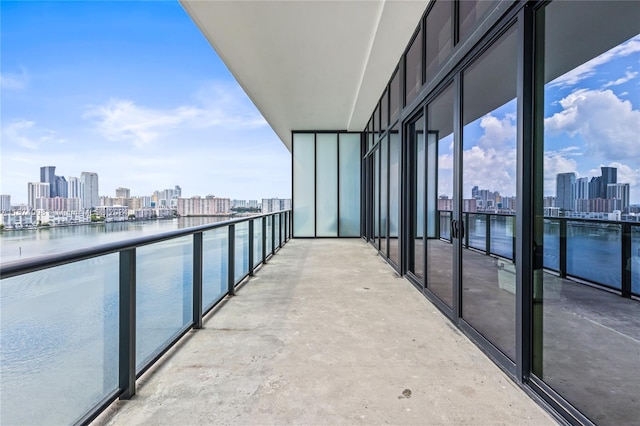 balcony featuring a water view