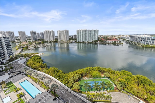 birds eye view of property with a water view