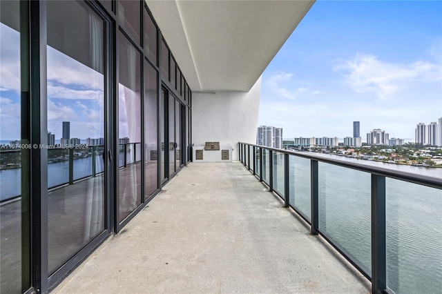 balcony featuring a water view