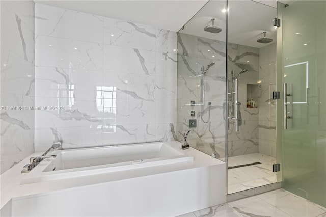 bathroom with tile flooring, tile walls, and plus walk in shower