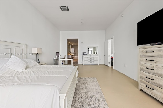 bedroom with concrete flooring