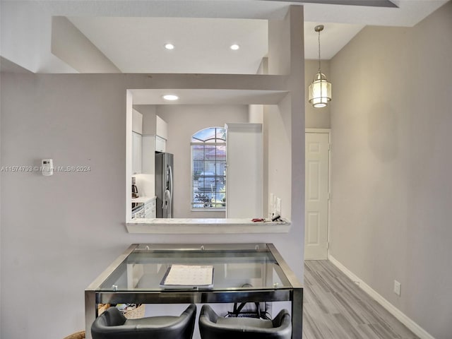 dining room featuring light wood-type flooring