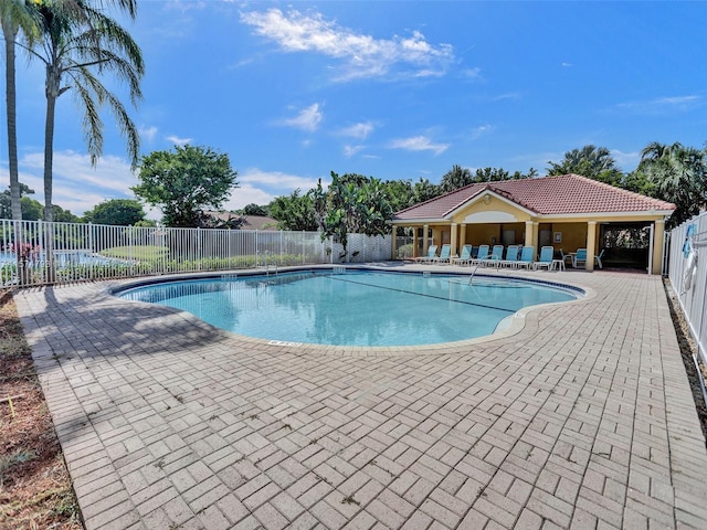 view of swimming pool featuring a patio