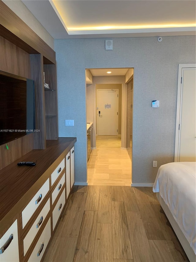 bedroom with light hardwood / wood-style flooring