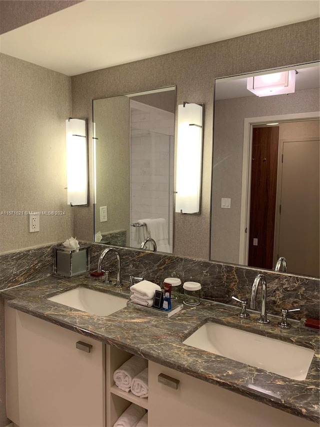 bathroom with dual bowl vanity