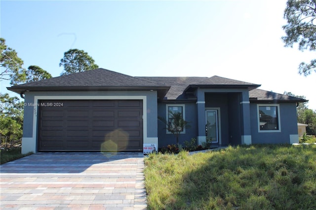 view of front of house with a garage