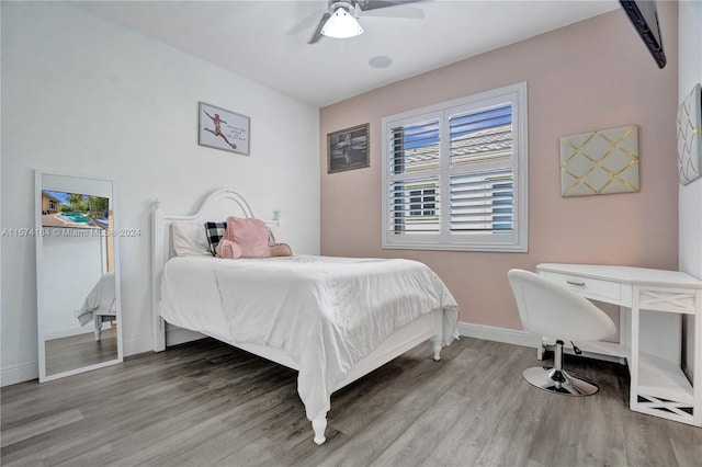 bedroom featuring wood-type flooring and ceiling fan