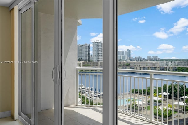 balcony with a city view and a water view