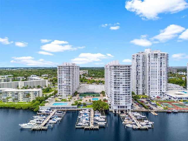 aerial view featuring a water view and a city view