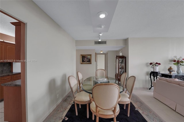 dining room featuring light tile flooring