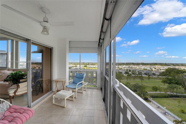 balcony featuring ceiling fan