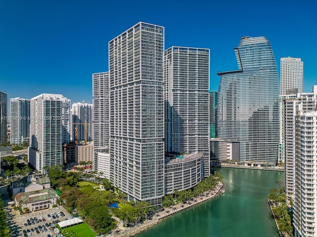 property's view of city featuring a water view