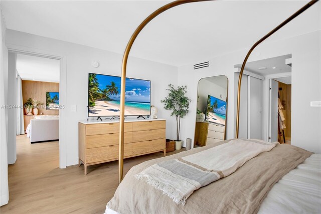 bedroom with light wood-type flooring