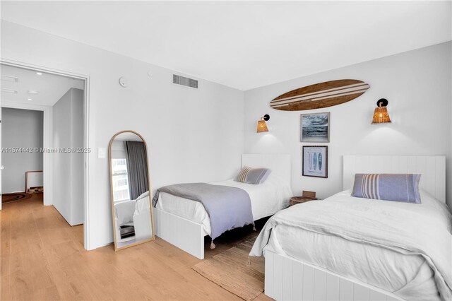 bedroom featuring light wood-type flooring