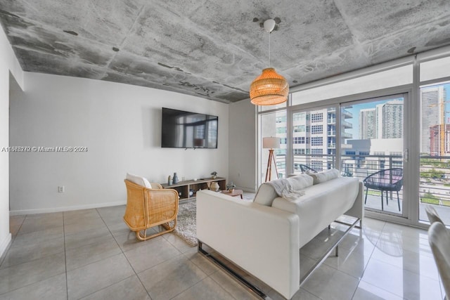 living room with tile patterned floors and a wealth of natural light