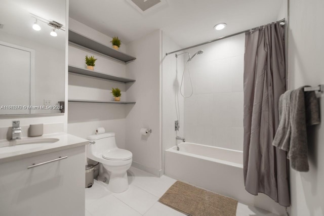 full bathroom with tile patterned flooring, vanity, toilet, and shower / tub combo with curtain