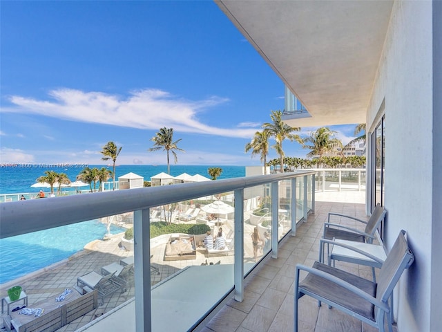 balcony featuring a water view