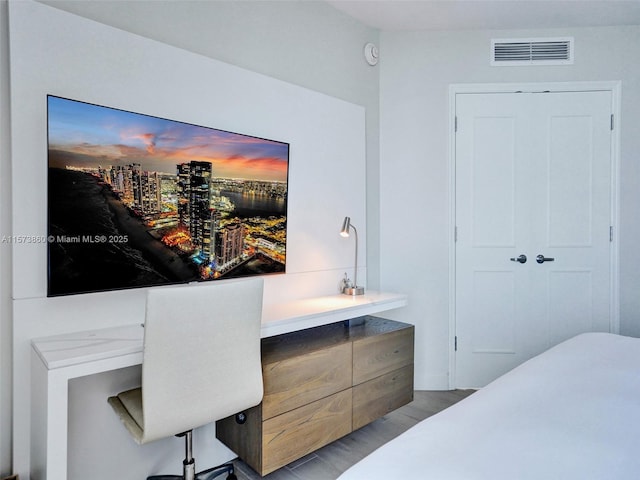 bedroom with light hardwood / wood-style floors